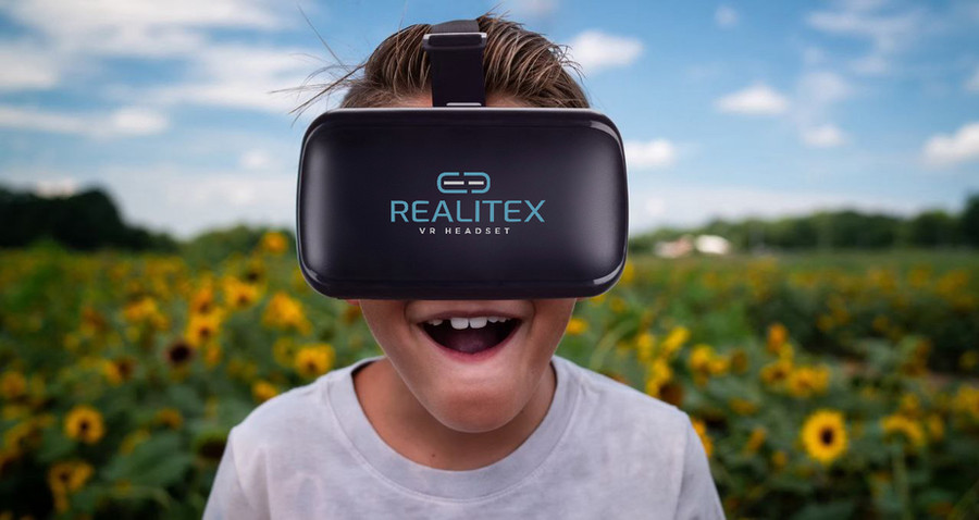 Kid in a sunflower field wearing a Realitex VR headset